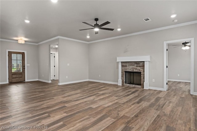 unfurnished living room with visible vents, wood finished floors, baseboards, and ceiling fan