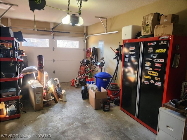 garage featuring a garage door opener and electric panel