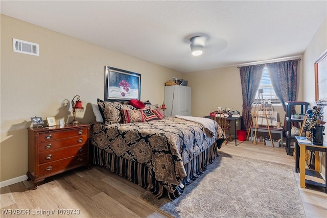 bedroom featuring light hardwood / wood-style flooring