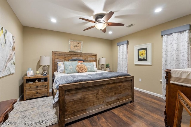 bedroom featuring dark wood-type flooring and ceiling fan