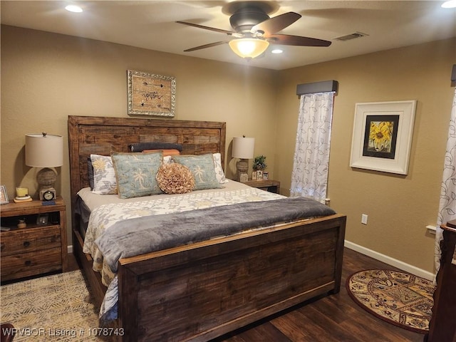 bedroom featuring hardwood / wood-style floors and ceiling fan