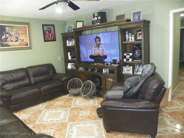 tiled living area with a ceiling fan