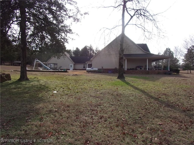 exterior space with a yard