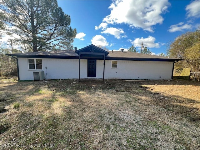 rear view of house with central AC