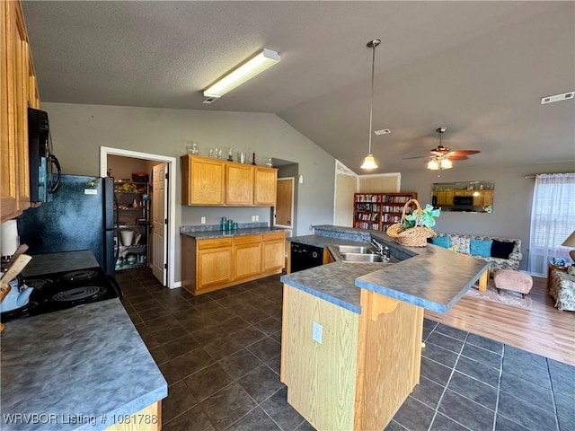 11739 282nd Hwy, Mountainburg, AR 72946 - kitchen featuring black appliances, vaulted ceiling, a ceiling fan, dark tile patterned flooring, and a large island