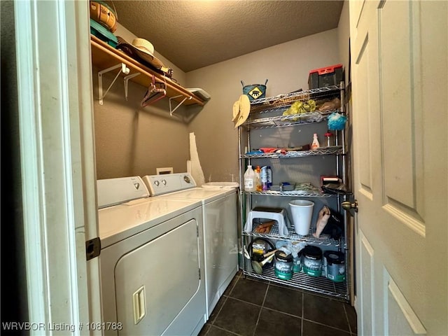 11739 282nd Hwy, Mountainburg, AR 72946 - washroom featuring washing machine and dryer, dark tile patterned floors, and a textured ceiling