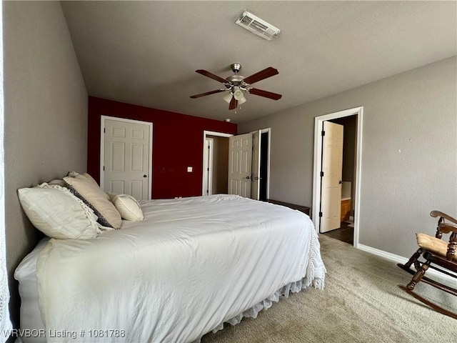 11739 282nd Hwy, Mountainburg, AR 72946 - carpeted bedroom featuring ceiling fan and ensuite bathroom