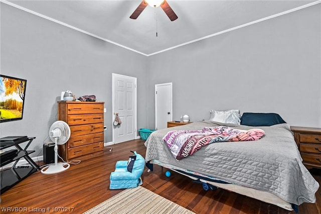 bedroom featuring wood finished floors and a ceiling fan
