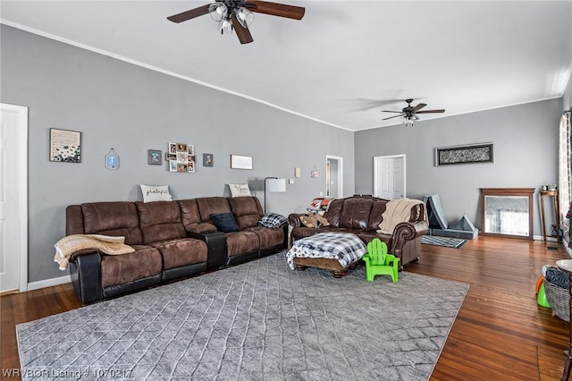 living area with ceiling fan, wood finished floors, and crown molding