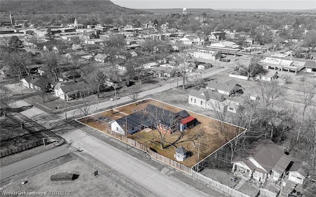 aerial view of residential area with mountains