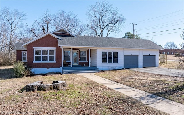 single story home with a garage, crawl space, asphalt driveway, covered porch, and brick siding