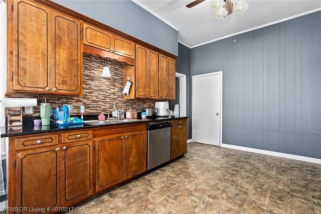 kitchen featuring dishwasher, decorative backsplash, a sink, dark countertops, and a ceiling fan