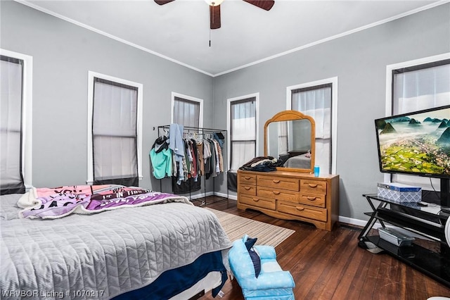 bedroom with hardwood / wood-style flooring, ornamental molding, baseboards, and ceiling fan