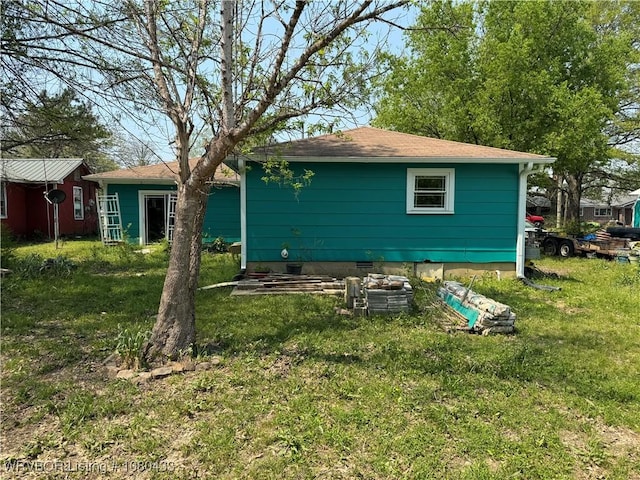 739 Pine St, Waldron, AR 72958 - back of property featuring a lawn