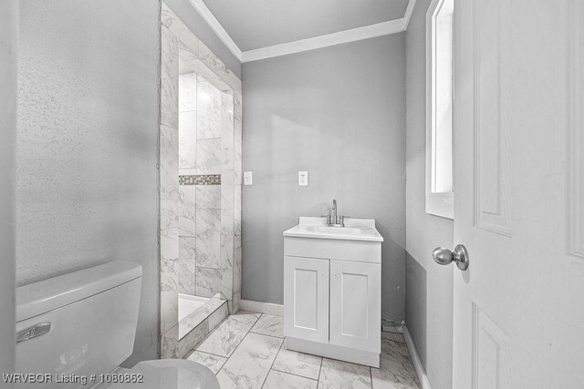 full bathroom with marble look tiles, toilet, crown molding, a shower stall, and baseboards