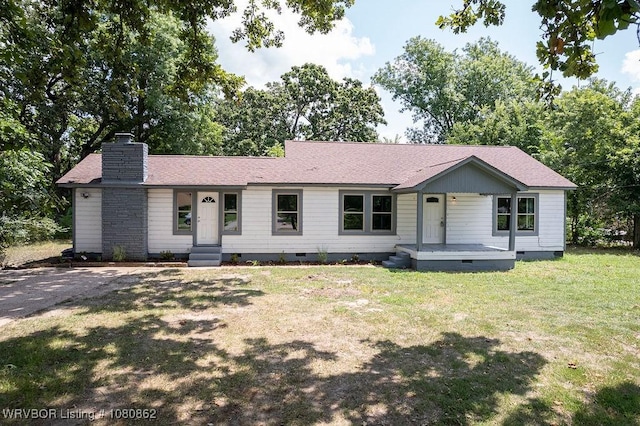 ranch-style house featuring crawl space, a front yard, a chimney, and a shingled roof
