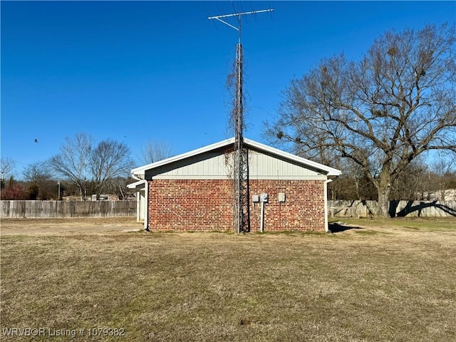 view of outdoor structure featuring fence