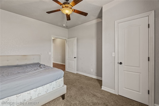 bedroom featuring carpet and ceiling fan