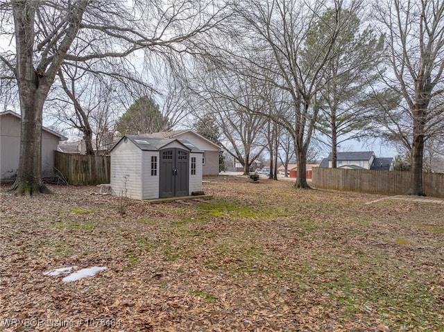 view of yard with a storage shed