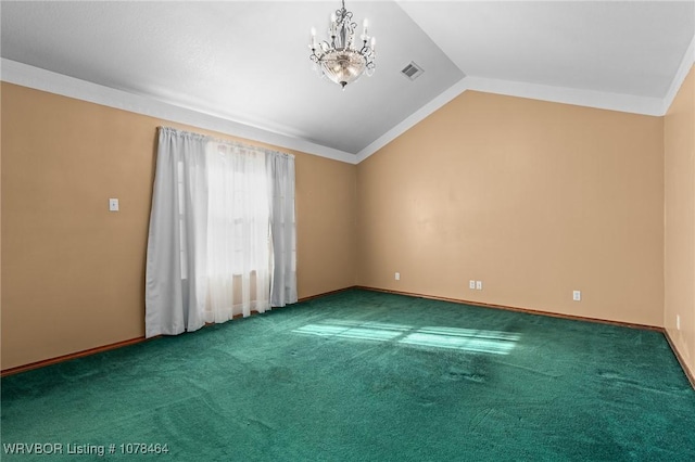 carpeted empty room featuring crown molding, a notable chandelier, and vaulted ceiling