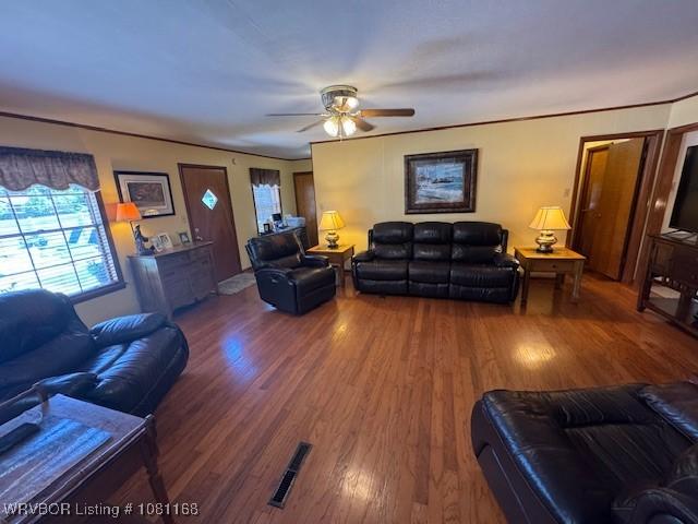 216 Jefferson Dr, Charleston, AR 72933 - living room featuring ceiling fan and wood finished floors
