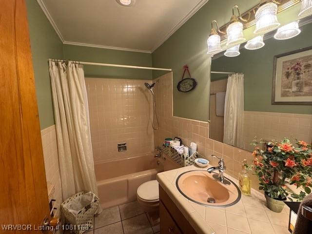 216 Jefferson Dr, Charleston, AR 72933 - full bath featuring tile patterned floors, vanity, shower / bath combination with curtain, tile walls, and crown molding