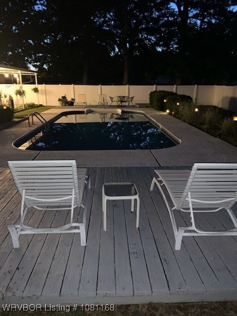 216 Jefferson Dr, Charleston, AR 72933 - view of pool featuring a deck and a fenced backyard