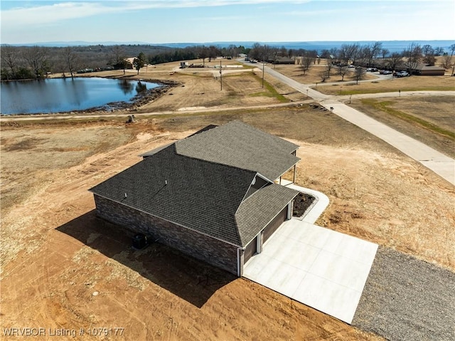 bird's eye view featuring a water view and a rural view