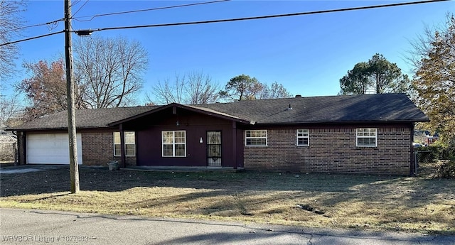 ranch-style house featuring a garage