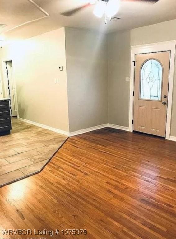 entryway with hardwood / wood-style floors and ceiling fan