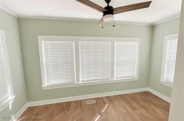 208 Cane Hill St, Van Buren, AR 72956 - unfurnished room featuring wood finished floors, ornamental molding, and a ceiling fan
