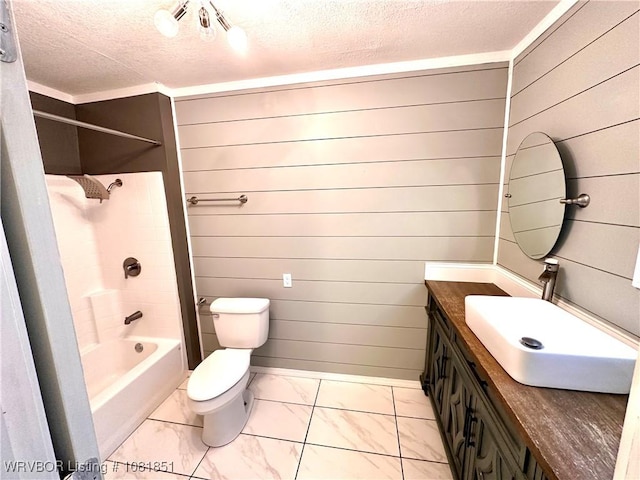 208 Cane Hill St, Van Buren, AR 72956 - full bath with a textured ceiling, marble look tile flooring, vanity, bathing tub / shower combination, and wooden walls