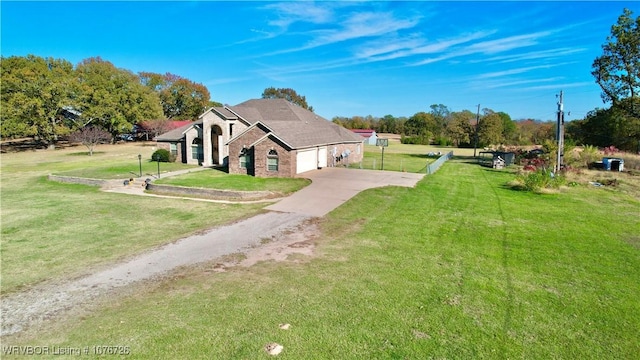 exterior space with a front lawn and a garage