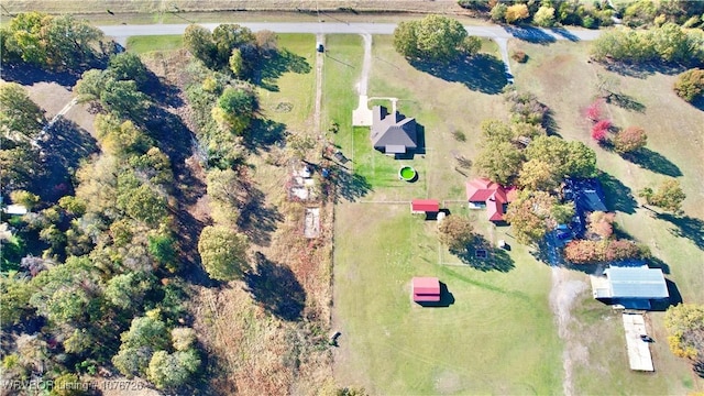 birds eye view of property featuring a rural view