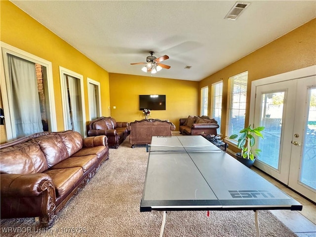 game room featuring french doors, ceiling fan, and lofted ceiling