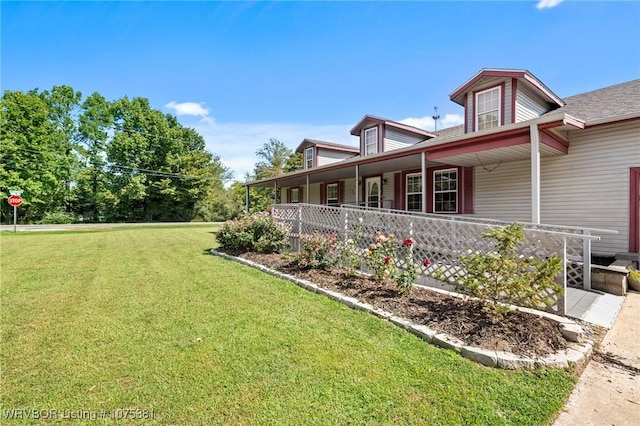 view of yard with a porch