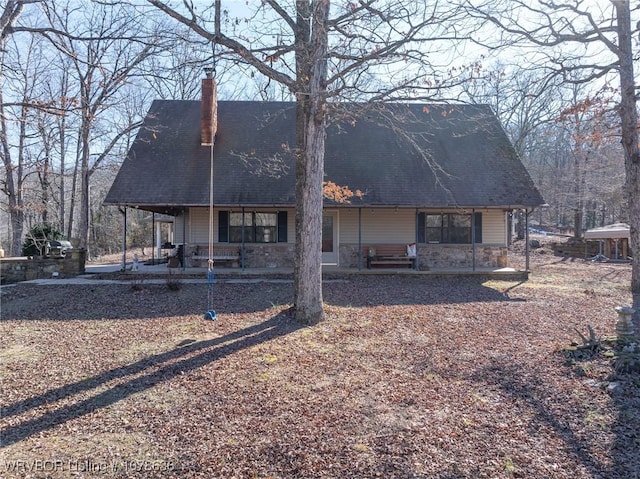 back of property with a patio area