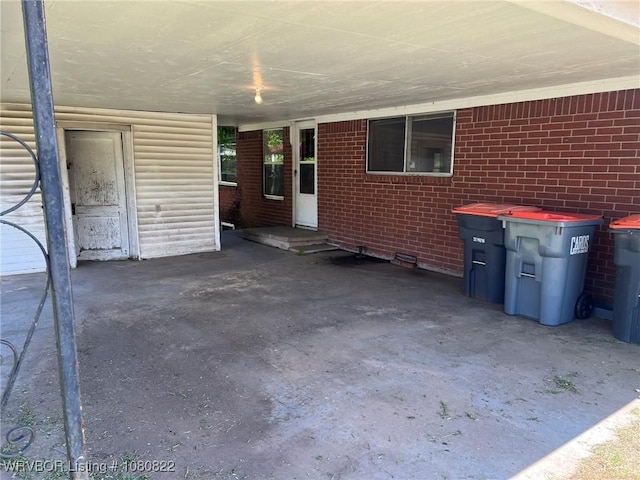 view of patio with a carport