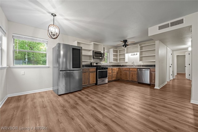 96708 S 4515, Vian, OK 74962 - kitchen featuring open shelves, appliances with stainless steel finishes, a sink, and dark countertops
