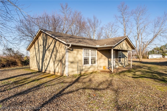 exterior space with a front yard