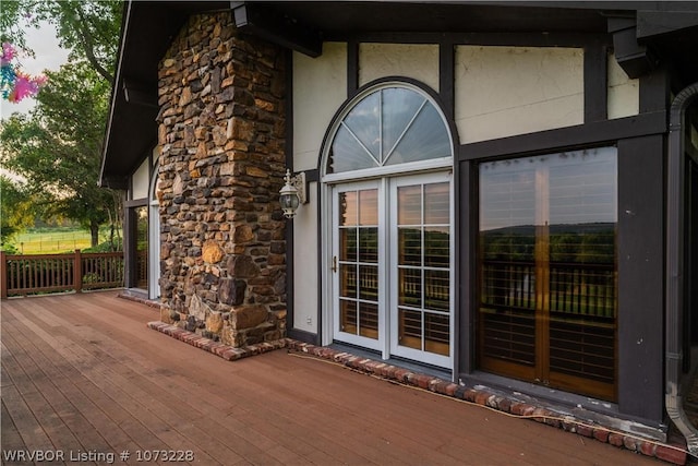 exterior space featuring a wooden deck