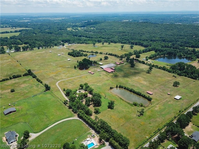 aerial view with a water view and a rural view