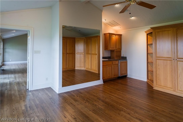 kitchen featuring lofted ceiling with beams, dark wood-type flooring, ceiling fan, and ornamental molding