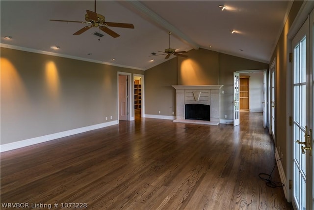 unfurnished living room featuring ornamental molding, lofted ceiling with beams, ceiling fan, and dark wood-type flooring