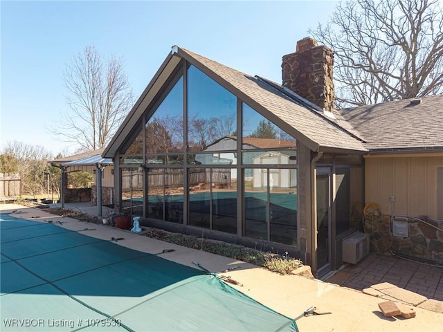 view of pool with a fenced in pool, a patio, and fence