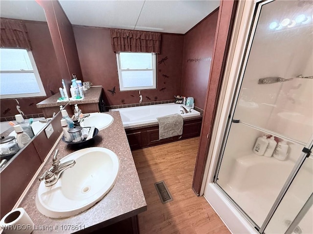 205 Lee Ordner, Panama, OK 74951 - full bath featuring a sink, a garden tub, a stall shower, and double vanity
