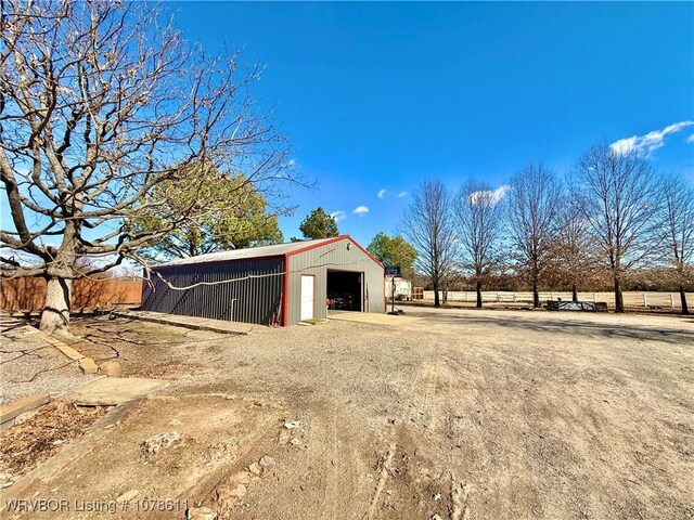 205 Lee Ordner, Panama, OK 74951 - view of outbuilding with an outdoor structure and dirt driveway