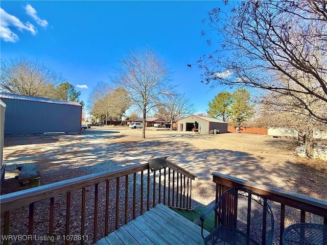 205 Lee Ordner, Panama, OK 74951 - wooden deck featuring an outbuilding