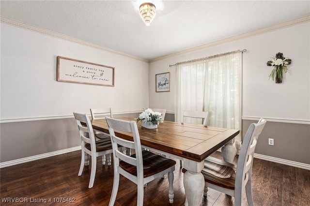 dining area featuring dark hardwood / wood-style flooring and crown molding