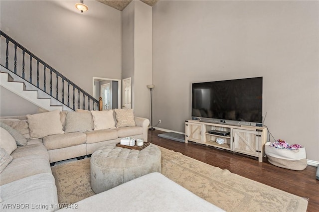 living room featuring dark hardwood / wood-style floors